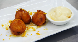 Natasha’s ricotta fritters with mascarpone cheese and a orange syrup on MasterChef