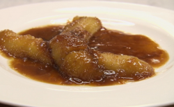 John Whaite’s flambéed bananas dessert on Chopping Board