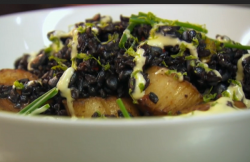 Luis Pous’s scallops with black rice starter cooked at Asia De Cuba restaurant on Celebrit ...