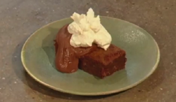 Andi’s brownies with chocolate ganache and rum flavoured  whipped cream dessert on Christm ...