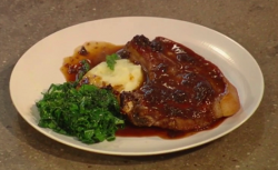 Andi’s Pork chops with prunes and and kale dish on Christmas Kitchen