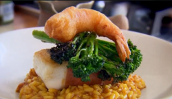 Paul Merrett and Lucy’s hake wrapped in Serrano ham with risotto and broccoli on The Secret Chef