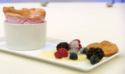 Lindsey’s raspberry souffle with ice berries and white chocolate sauce on  Masterchef 2017