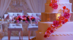 Keisha’s 7 tier gold and floral wedding cake on Extreme Cake Makers