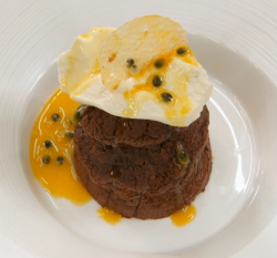 Angellica Bell’s chocolate mousse cake with passion fruit coulis and Chantilly cream on Ce ...