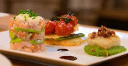 The King family scallop on a bed of pea and mint puree, Parmesan wafer biscuits with baby leeks  ...