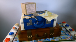 Eloise Durrant evacuee suitcase cake with cupcakes for a 90′s Birthday party on Extreme Ca ...