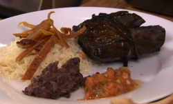 Slow roasted shoulder of pork with papaya salsa and garlic fried rice on The Hungry Sailors