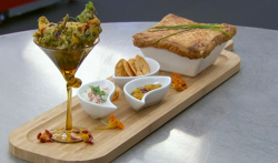 Moonira’s chicken chilman biryani with a pastry top, served with spinach and potato pakora ...