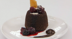 Sesi’s chocolate cake with ganache and blackberry sauce made using her mom’s recipe  ...