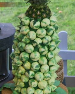 Ella’s pineapple party meringue tower on The Great Celebrity Bake Off Stand Up to Cancer.