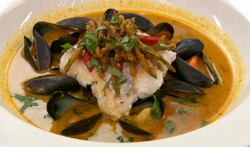 Nisha’s pan fried hake with crispy samphire pakoras and mussels in a Malaysian laksa style broth ...