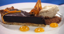 Blue team’s chocolate ganache tart with orange gel and orange chantilly cream on Masterche ...