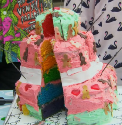 Aisling’s slice of pride rainbow cake on The Great Celebrity Bake Off Stand Up to Cancer