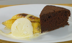 James Martin chocolate cake with caramel flambe bananas in rum served with vanilla ice cream on  ...