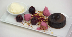 Spencer Matthews chocolate fondant with creme fresh sorbet and brandy soaked cherries dessert on ...