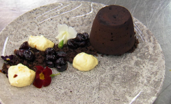 Delia’s mulled wine chocolate fondant with cherry compote, orange cream and a chestnut ice ...