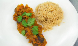 Amal’s lamb meatballs in spicy tomato sauce with mustard and cardamon seeds rice and a gre ...