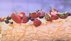 Helen Goh’s rolled pavlova with summer berries and rosewater cream on Sunday Brunch