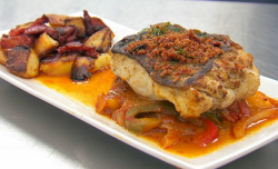 Neil Ruddock’s pan fried cod with potatoes and  a pepper and tomato sauce on Celebrity Mas ...