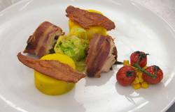 Neil Ruddock’s bacon wrapped  chicken with cabbage, potato, tomatoes and a Spanish sweet pepper  ...