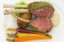 Greg Rutherford’s tarragon and mint crusted rack of lamb with potatoes, a garlic and onion ...