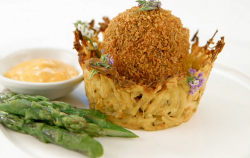 Greg Rutherford’s chorizo scotch egg in a curry potato rosti nest with asparagus and mayo  ...