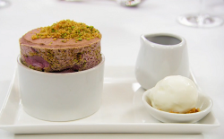 Exose’s cherry souffle with pistachio crumble, sheep’s milk yoghurt sorbet and a sou ...