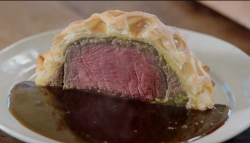 Jamie’s beef Wellington for two with mushrooms,  spinach pancakes and a onion and thyme gr ...