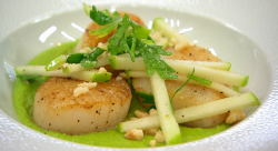 Teddy’s pan fried scallops with a hazelnuts, apple and herb salad on a bed of pea puree on ...