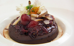 Marla’s chocolate brownie with a cherry and fig compote and coconut cream on Masterchef 2020