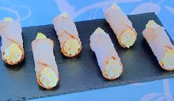 Paul Hollywood’s cannoli with whipped cream, stem ginger and orange zest on The Great Cele ...