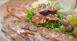 Ainsley Harriott’s Charcuterie board with honey and hazelnut figs and chilli-glazed grapes ...