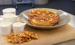 Alex’s apple tarte tatin with cinnamon and calvados, served with a almond brittle and crem ...