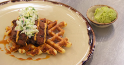 Thomas’ Jalapeno and cheddar waffle with buttermilk fried chicken and a avocado and lime s ...