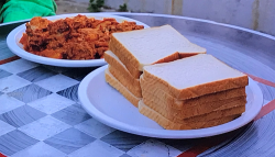 Michael Portillo and Sarah’s devil curry with bread on Great Asian Railway Journeys