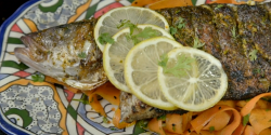 Ainsley Harriott’s BBQ chermoula sea bass with a carrot ribbon and coriander salad on Ainsley ...