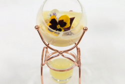 Lady Leshurr’s  pineapple and passion fruit posset with rum and eatable flowers dessert on Celeb ...