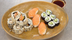John Torode’s tempura prawn sushi rolls with rice, California rolls, salmon nigiri and a d ...