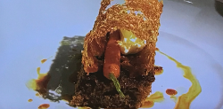 James Martin’s carrot cake with candied carrot, praline tuile, orange syrup and cream chee ...