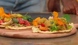 Freddie’s tapenade flatbread with heritage tomato,  watermelon salad and deep fried avocad ...