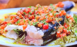Tom Kerridge’s whole BBQ sea bass supper with a French Provencal sauce vierge and dressed brocco ...