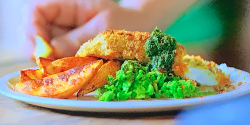 Jamie Oliver fish and chips with potato wedges and mushy vegetables on Jamie: Keep Cooking Famil ...