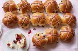 Nadiya Hussain hot cross buns with jam filling and pink crosses on Nadiya Bakes