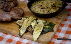 Sam and Shauna’s BBQ campfire potatoes with courgettes and butterfly leg of hogget on Satu ...