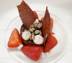 Sammy’s dark chocolate and cardamom delice with on a pistachios and bran flake base, straw ...