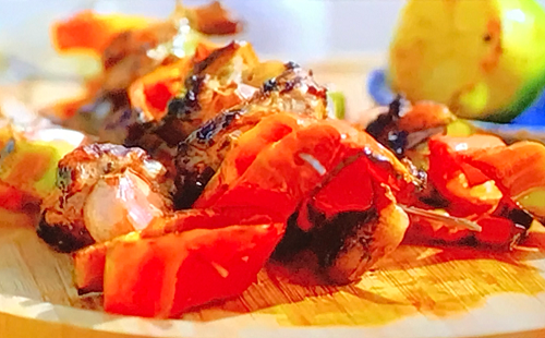 Nisha Katona  lamb kebabs with a tomato salad on A Taste Of Italy