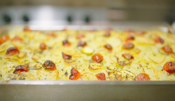 Hussain’s baked layered potatoes, vegetables , rice and mussels dish on A Taste of Italy w ...